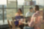 Woman starring at a conference room